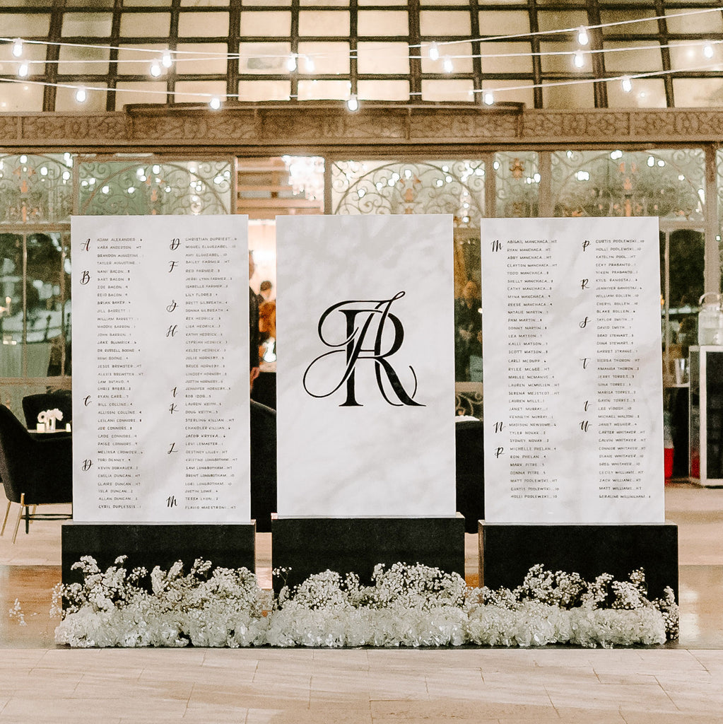 wedding seating chart with Elegant Quill monogram